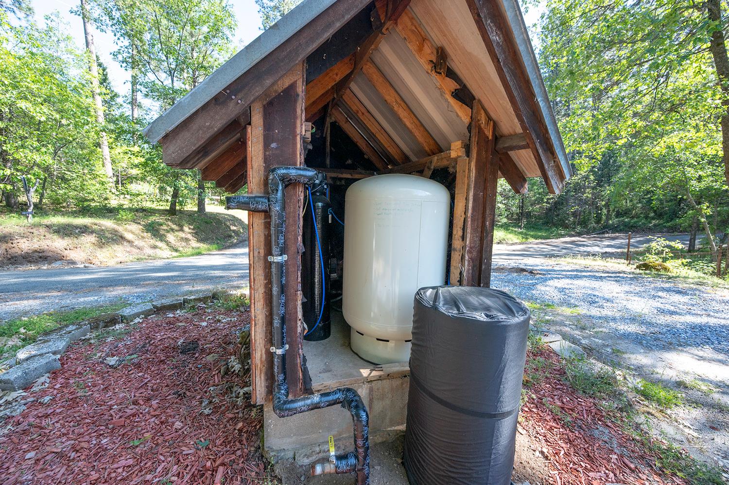 6141 Sweeney Road Somerset, CA 95684 - Photo 57 of 67 Well house and whole-home water softener system..