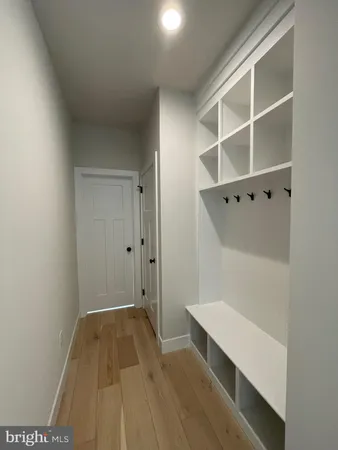 a room with walk in closet and window