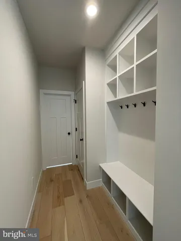 a room with walk in closet and window
