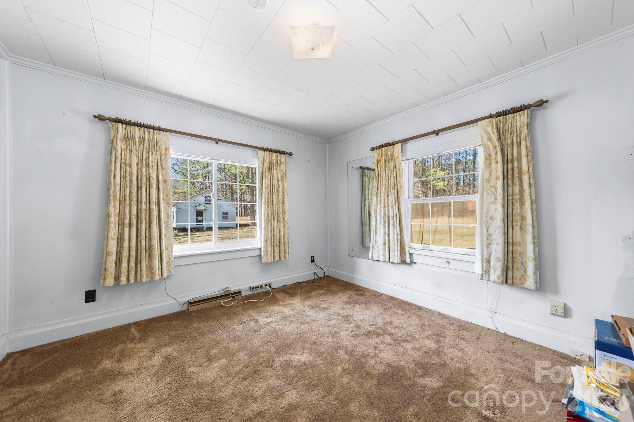 2350 Grubb Ferry Road Salisbury, NC 28144 - Photo 19 of 31 a view of an empty room with a window