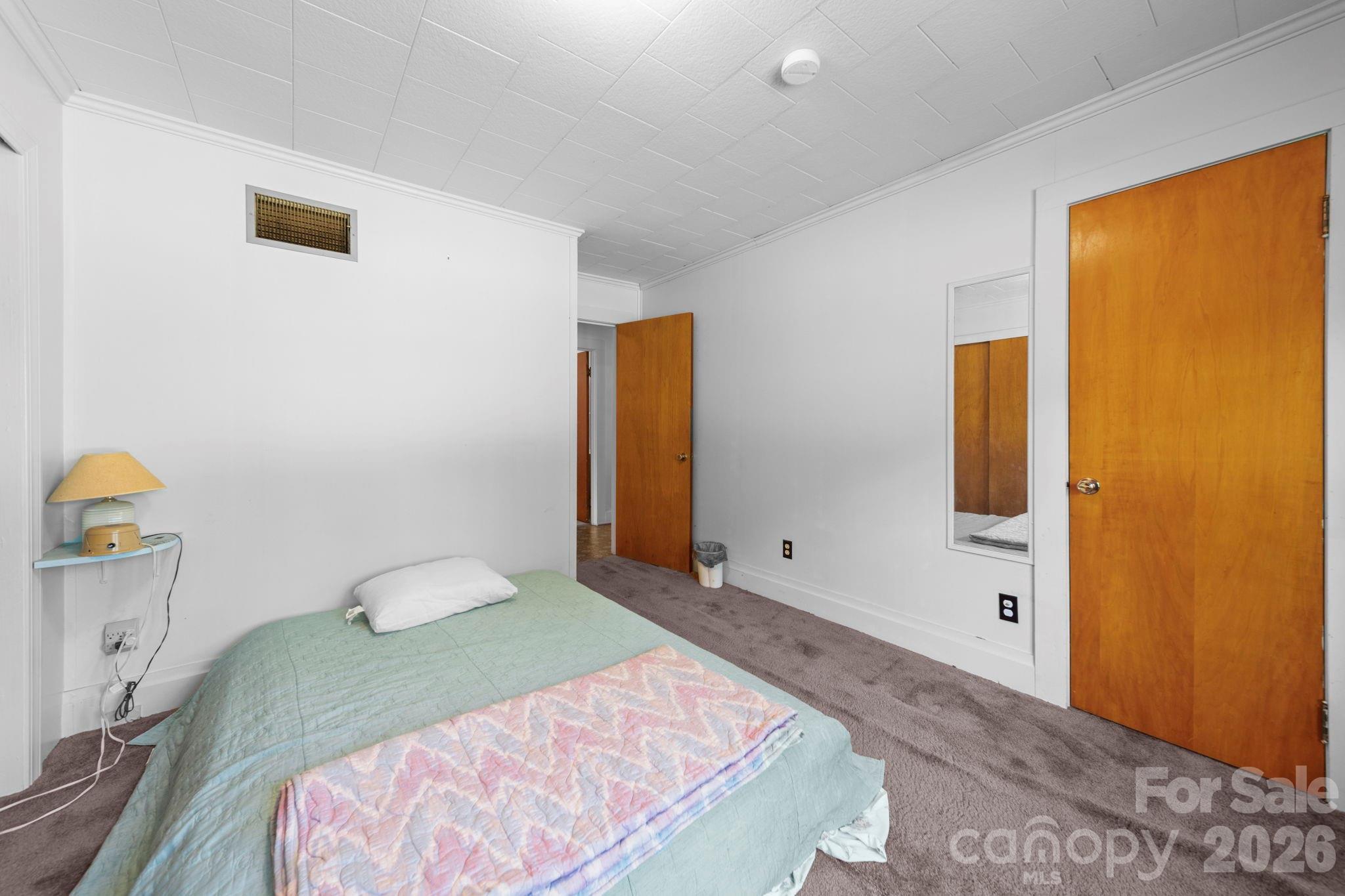 2350 Grubb Ferry Road Salisbury, NC 28144 - Photo 24 of 31 a bedroom with a bed and a dresser