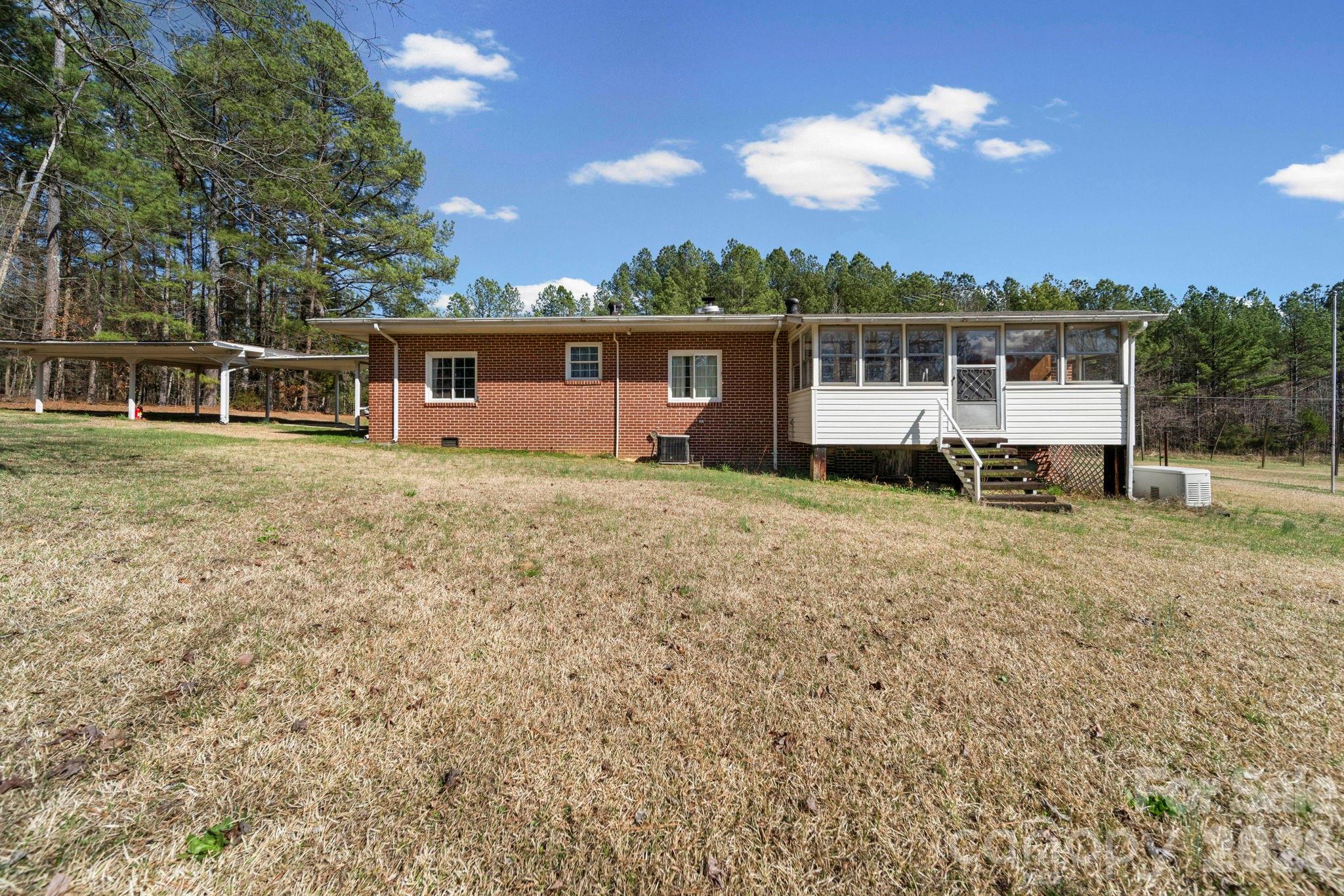 2350 Grubb Ferry Road Salisbury, NC 28144 - Photo 6 of 31 a house view with a garden space