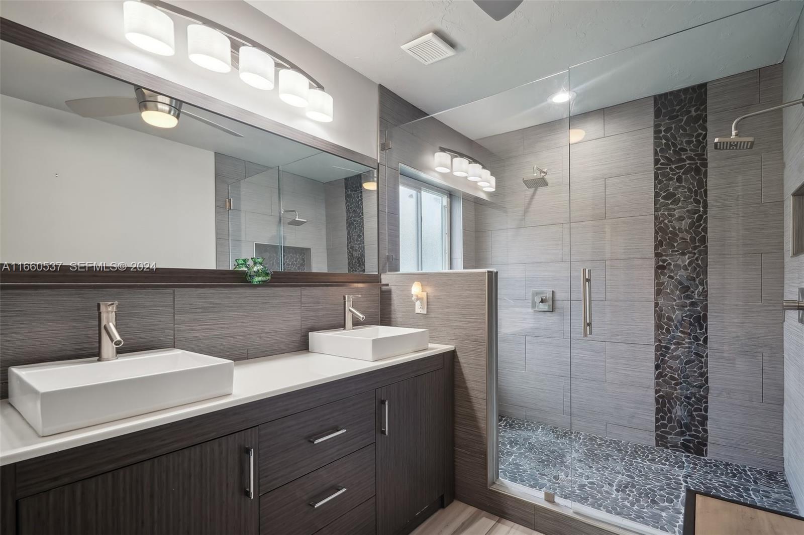 1164 Southwest 14th Street Boca Raton, FL 33486 - Photo 30 of 54 Luxurious main en-suite, dual vanities, & oversized shower