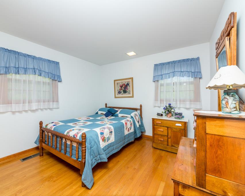 2960 Lewis Branch Road Tennessee Ridge, TN 37178 - Photo 16 of 24 a bedroom with a bed and a table in it