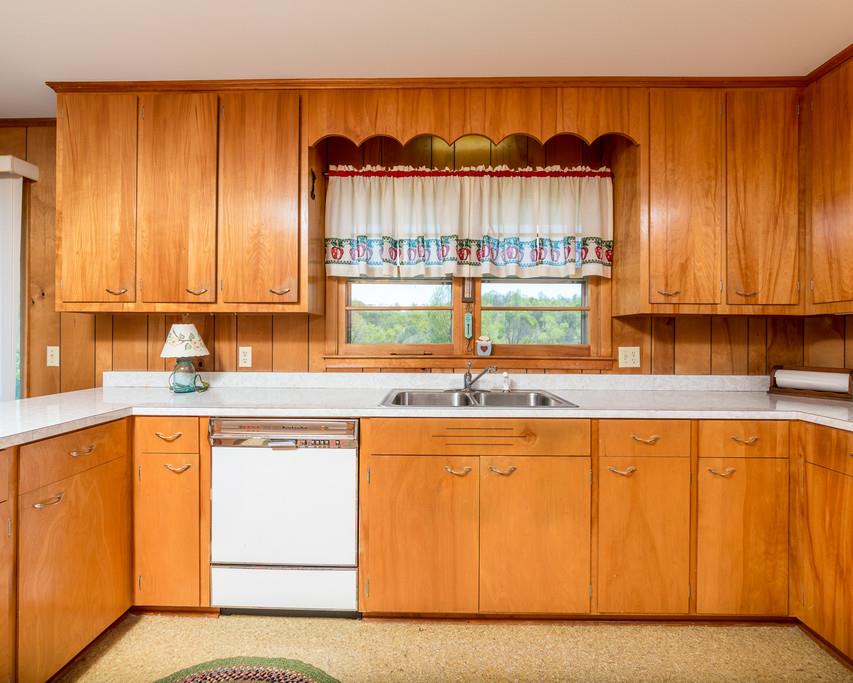 2960 Lewis Branch Road Tennessee Ridge, TN 37178 - Photo 10 of 24 a kitchen with stainless steel appliances granite countertop a coffee maker a sink and a microwave