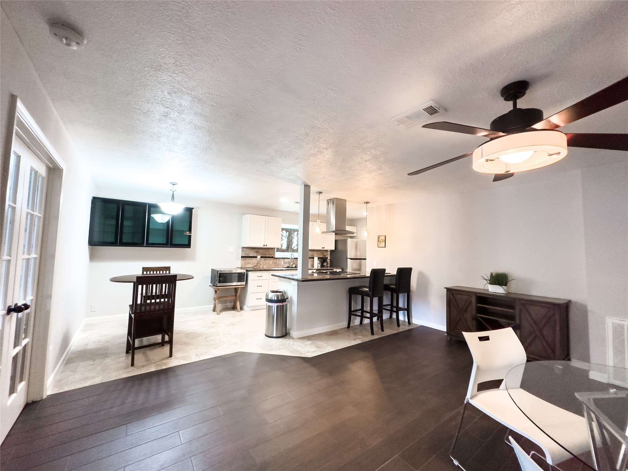 307 Shirleen Drive Pasadena, TX 77586 - Photo 11 of 27 Eat in kitchen, Wood flooring, tile all updated.