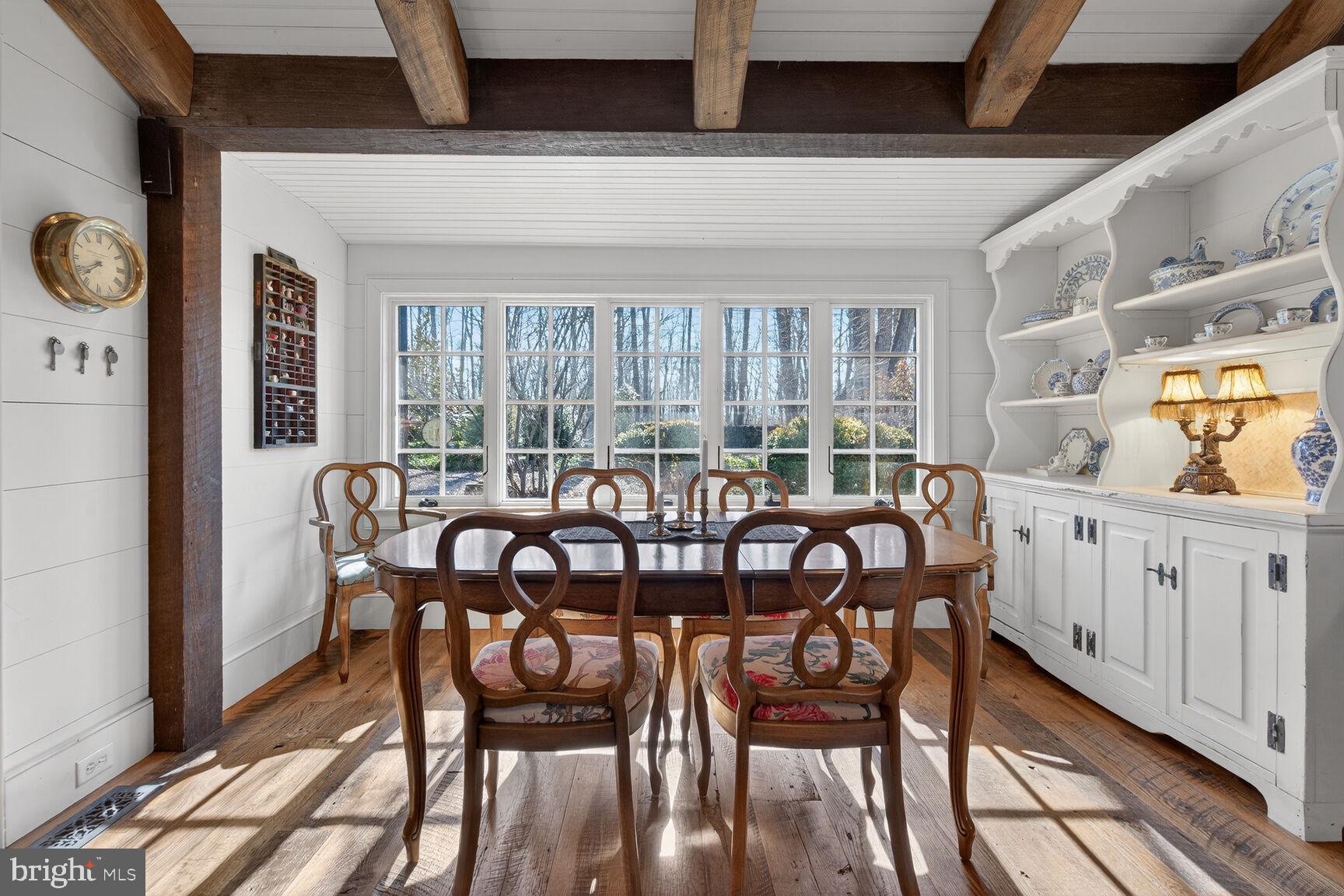 17651 Raven Rocks Road Bluemont, VA 20135 - Photo 22 of 87 a view of a dining room with furniture window and wooden floor