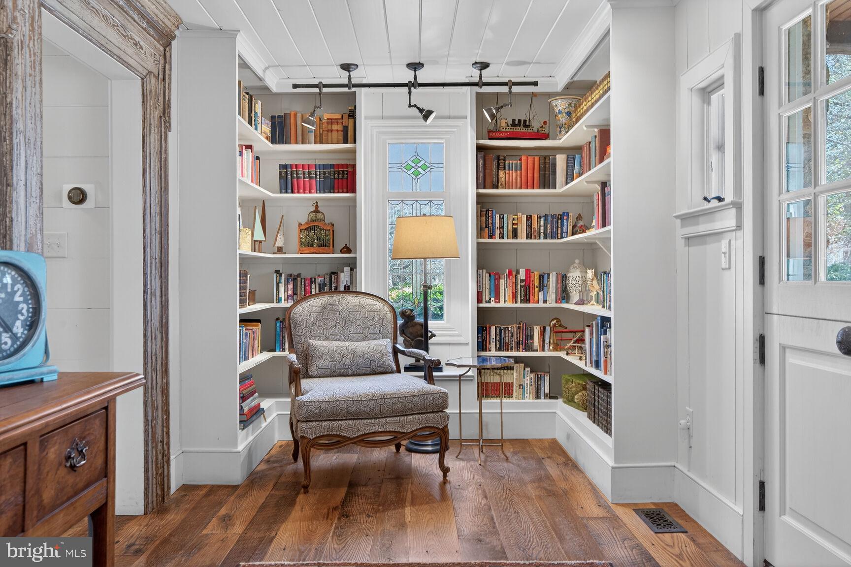 17651 Raven Rocks Road Bluemont, VA 20135 - Photo 27 of 87 a view of a workspace with furniture and a book shelf