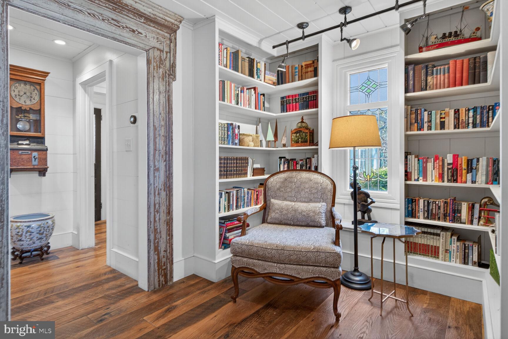 17651 Raven Rocks Road Bluemont, VA 20135 - Photo 28 of 87 a living room with furniture cabinets and a book shelf