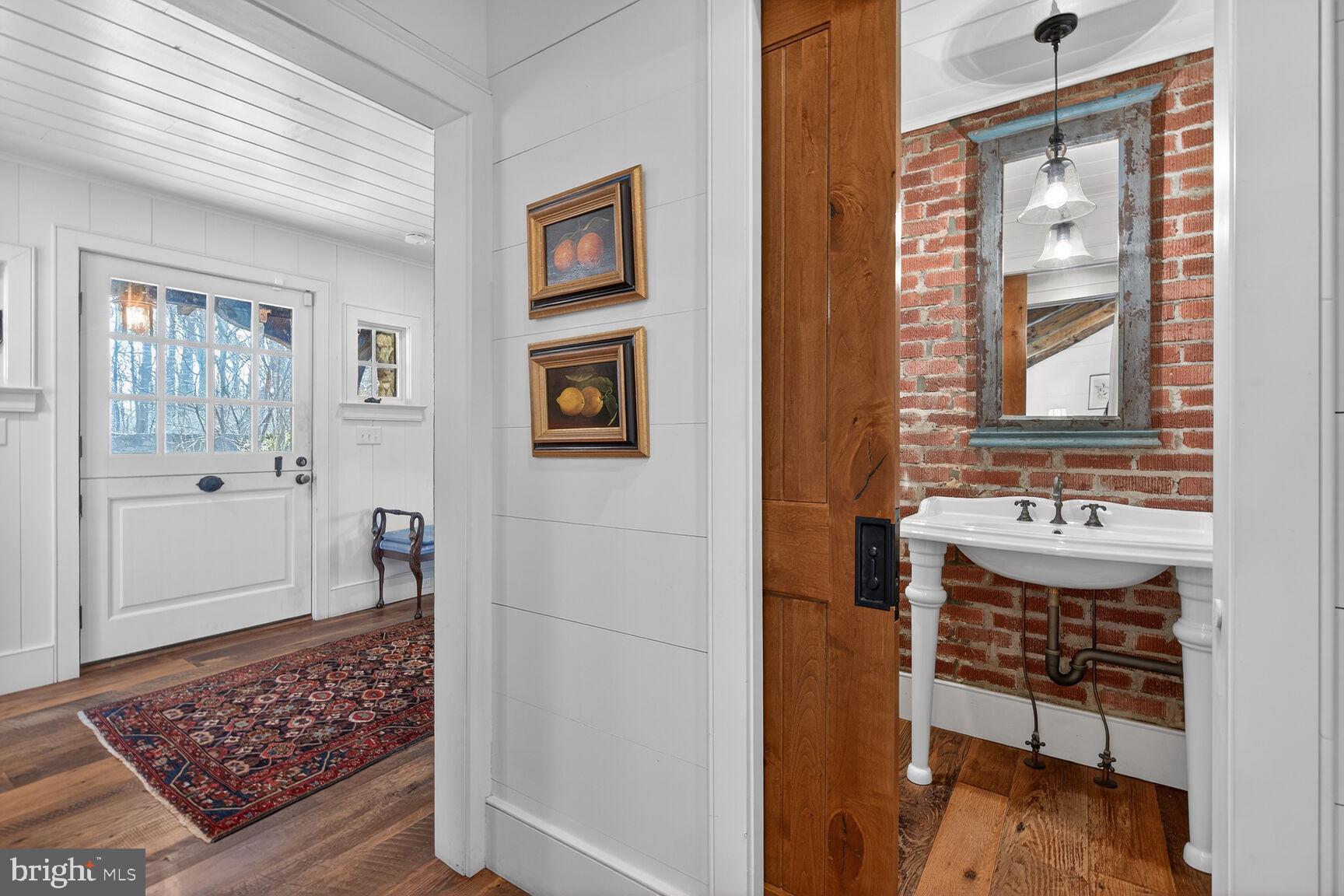 17651 Raven Rocks Road Bluemont, VA 20135 - Photo 29 of 87 Solid Wood Pocket Door on the Half Bathroom