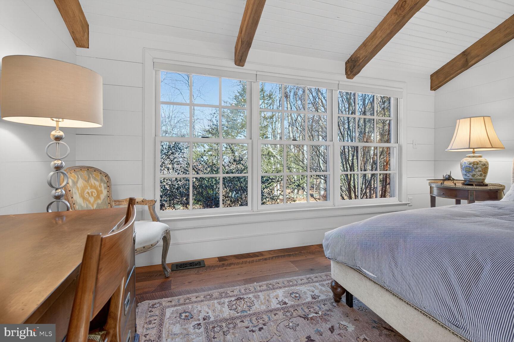 17651 Raven Rocks Road Bluemont, VA 20135 - Photo 35 of 87 a bedroom with a bed chair and a window