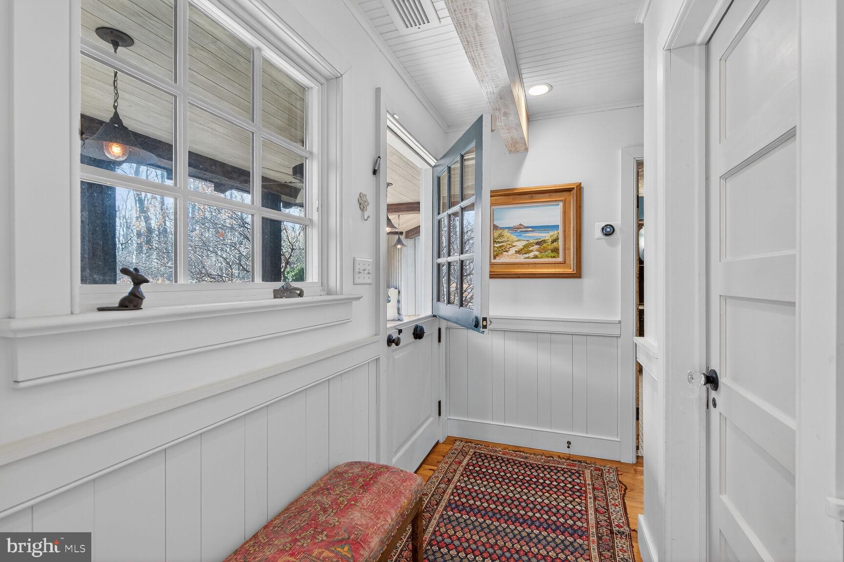 17651 Raven Rocks Road Bluemont, VA 20135 - Photo 48 of 87 a bedroom with a bed and a painting on the wall