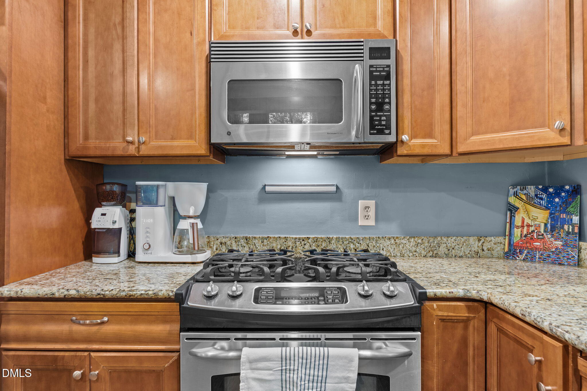 2408 Windsor Trail Raleigh, NC 27615 - Photo 12 of 45 a kitchen with granite countertop stainless steel appliances and cabinets