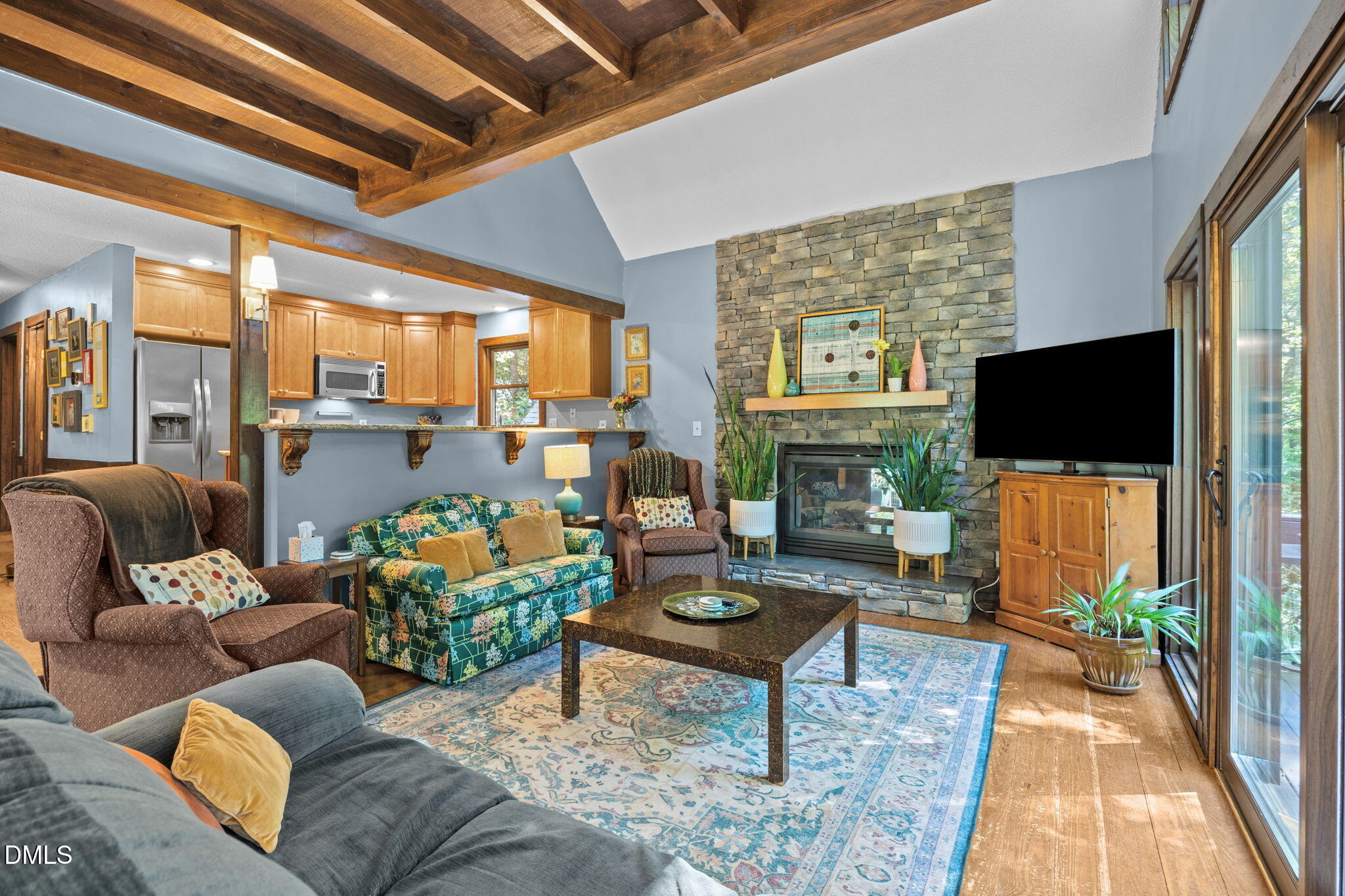 2408 Windsor Trail Raleigh, NC 27615 - Photo 15 of 45 a living room with furniture fireplace and flat screen tv