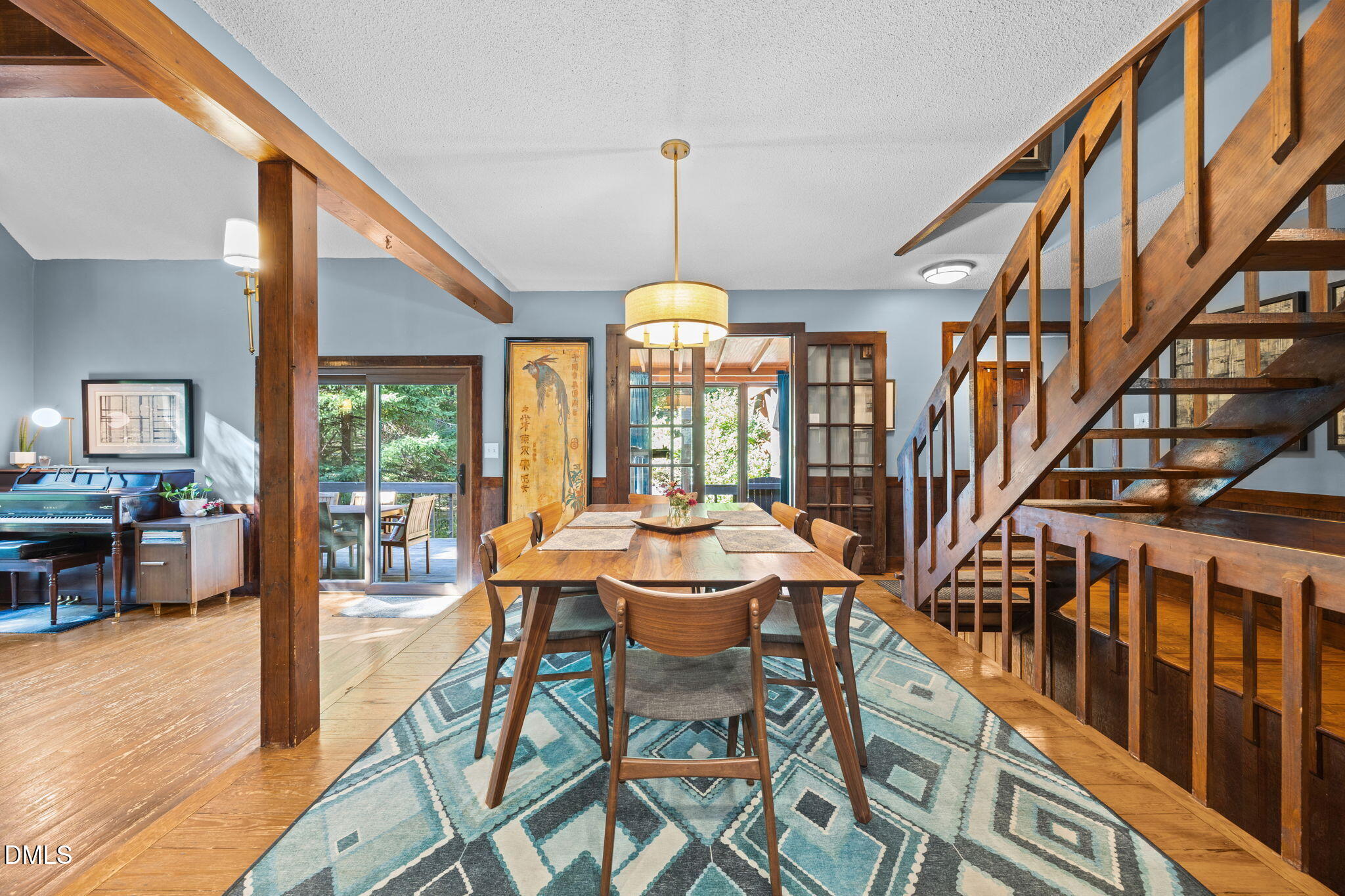 2408 Windsor Trail Raleigh, NC 27615 - Photo 18 of 45 a dining room with furniture entryway and wooden floor