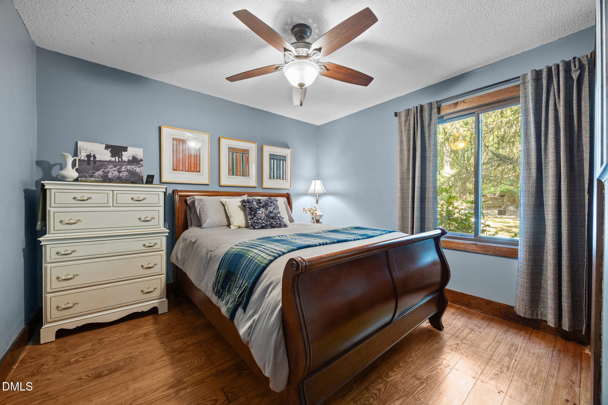 2408 Windsor Trail Raleigh, NC 27615 - Photo 22 of 45 a bed room with a bed and a window