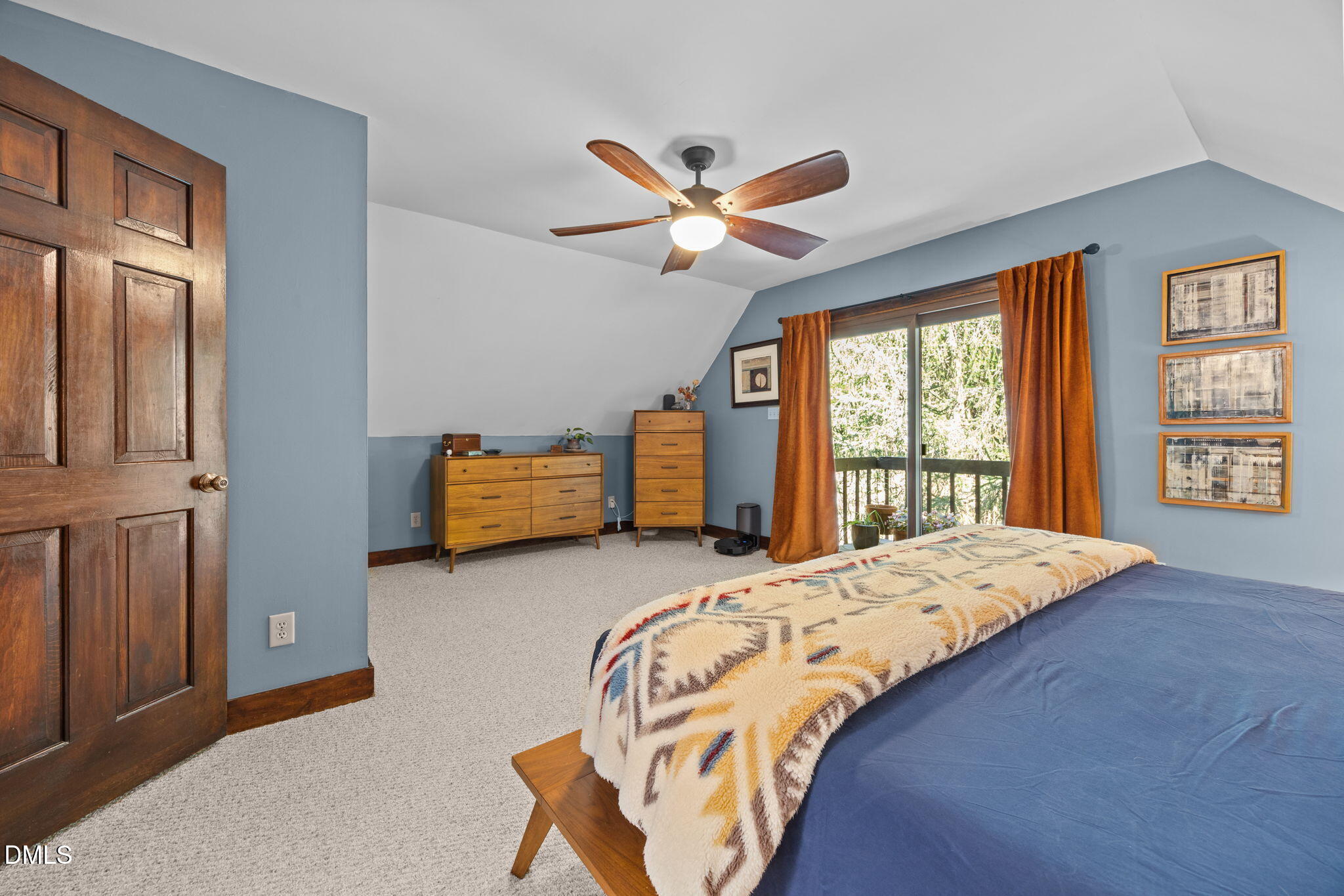 2408 Windsor Trail Raleigh, NC 27615 - Photo 24 of 45 a bedroom with a bed and a large window with a bookshelf