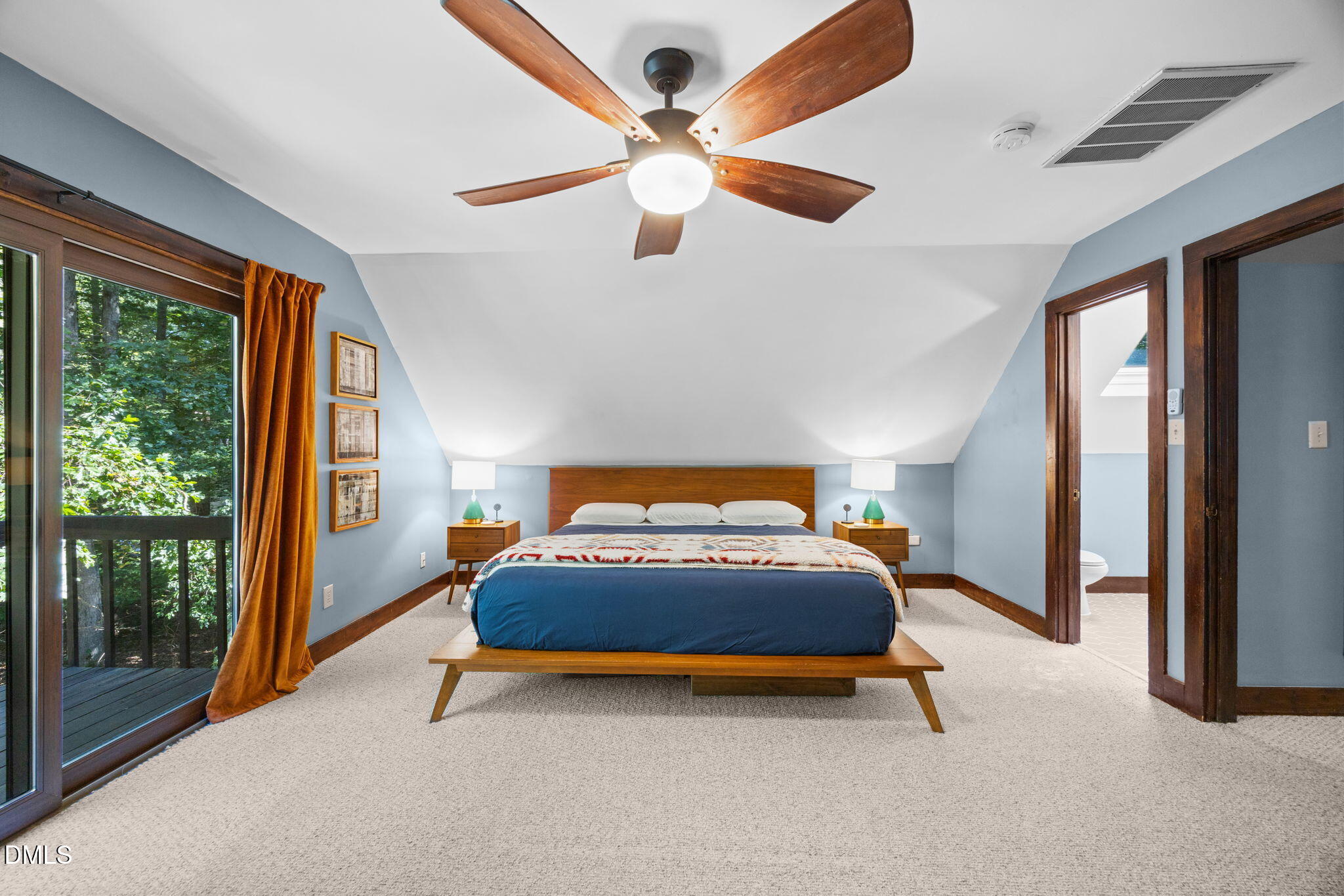 2408 Windsor Trail Raleigh, NC 27615 - Photo 25 of 45 a spacious bedroom with a bed and large windows