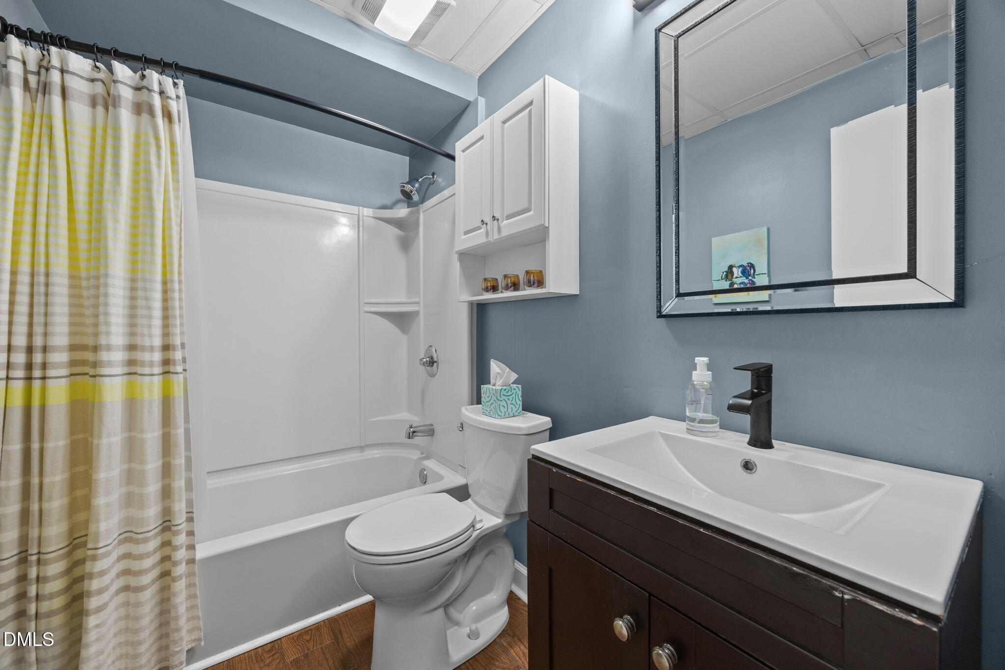 2408 Windsor Trail Raleigh, NC 27615 - Photo 33 of 45 a bathroom with a sink a toilet and shower