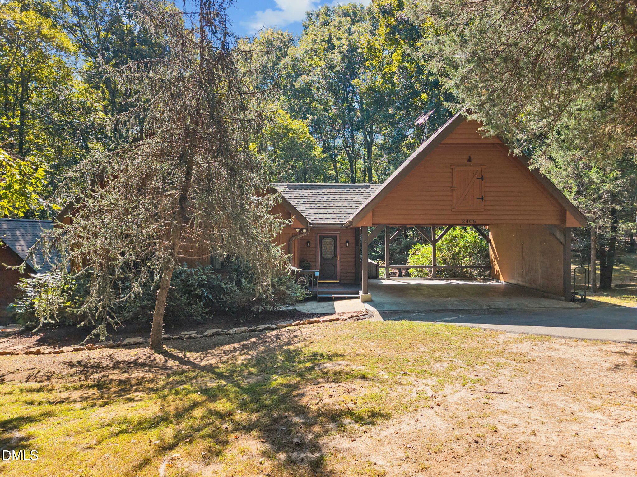 2408 Windsor Trail Raleigh, NC 27615 - Photo 3 of 45 a view of a house with a yard