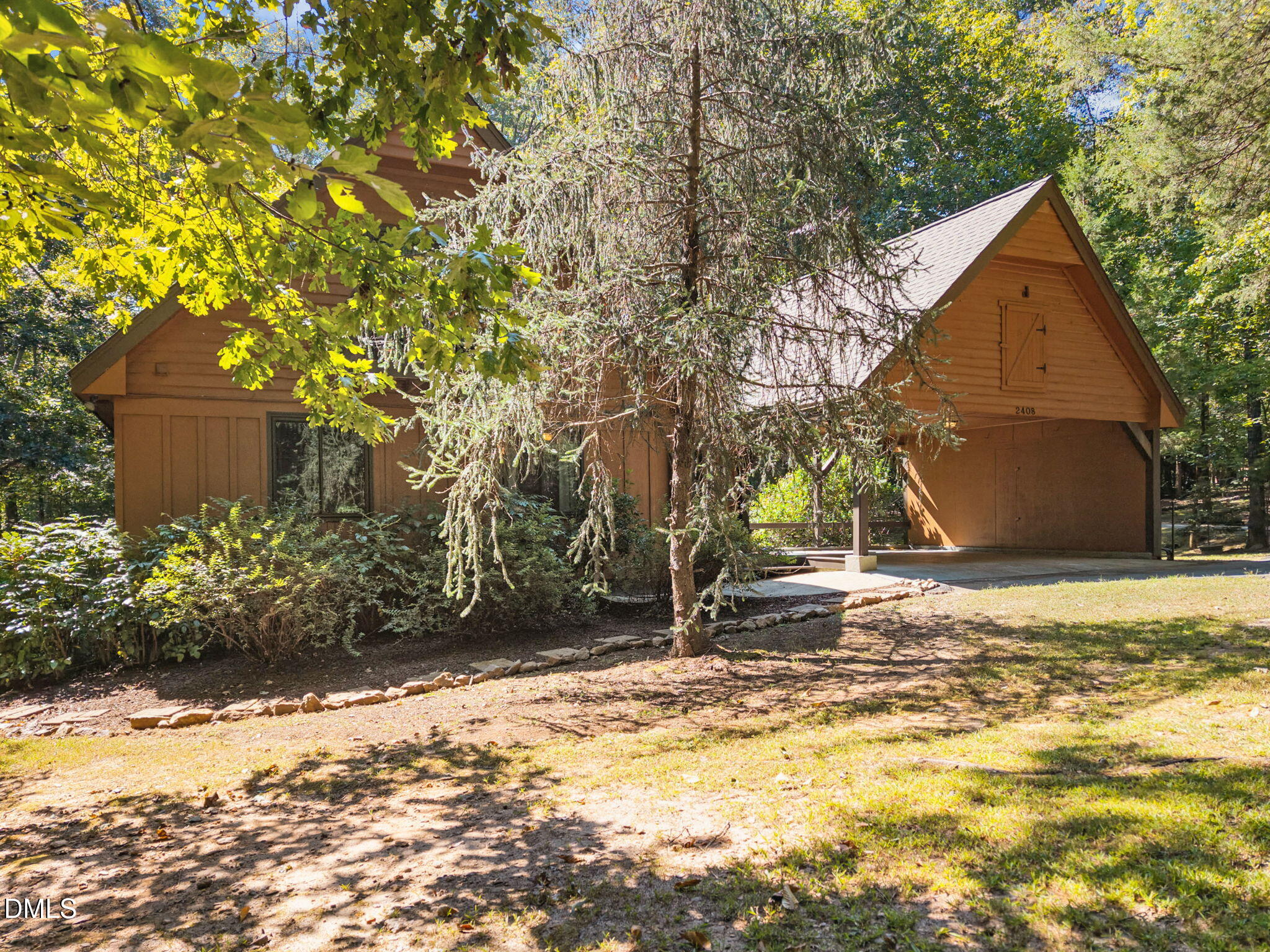 2408 Windsor Trail Raleigh, NC 27615 - Photo 4 of 45 a view of a house with snow on the road