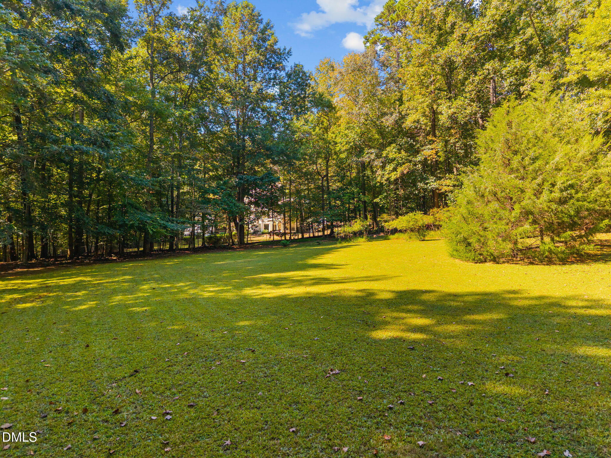 2408 Windsor Trail Raleigh, NC 27615 - Photo 5 of 45 a view of a swimming pool with an outdoor space and seating area