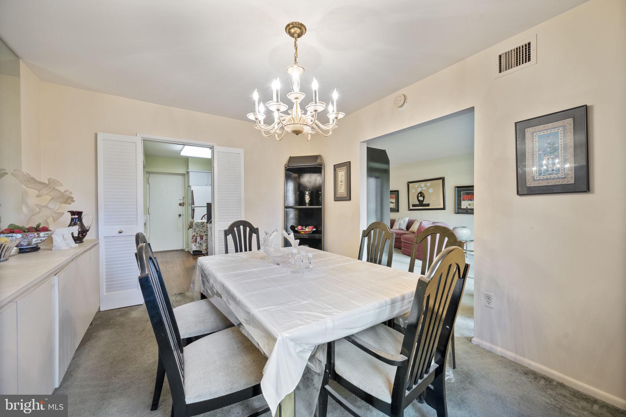7 Slade Avenue, Unit 119 Baltimore, MD 21208 - Photo 25 of 41 Dining Room looking to Family room