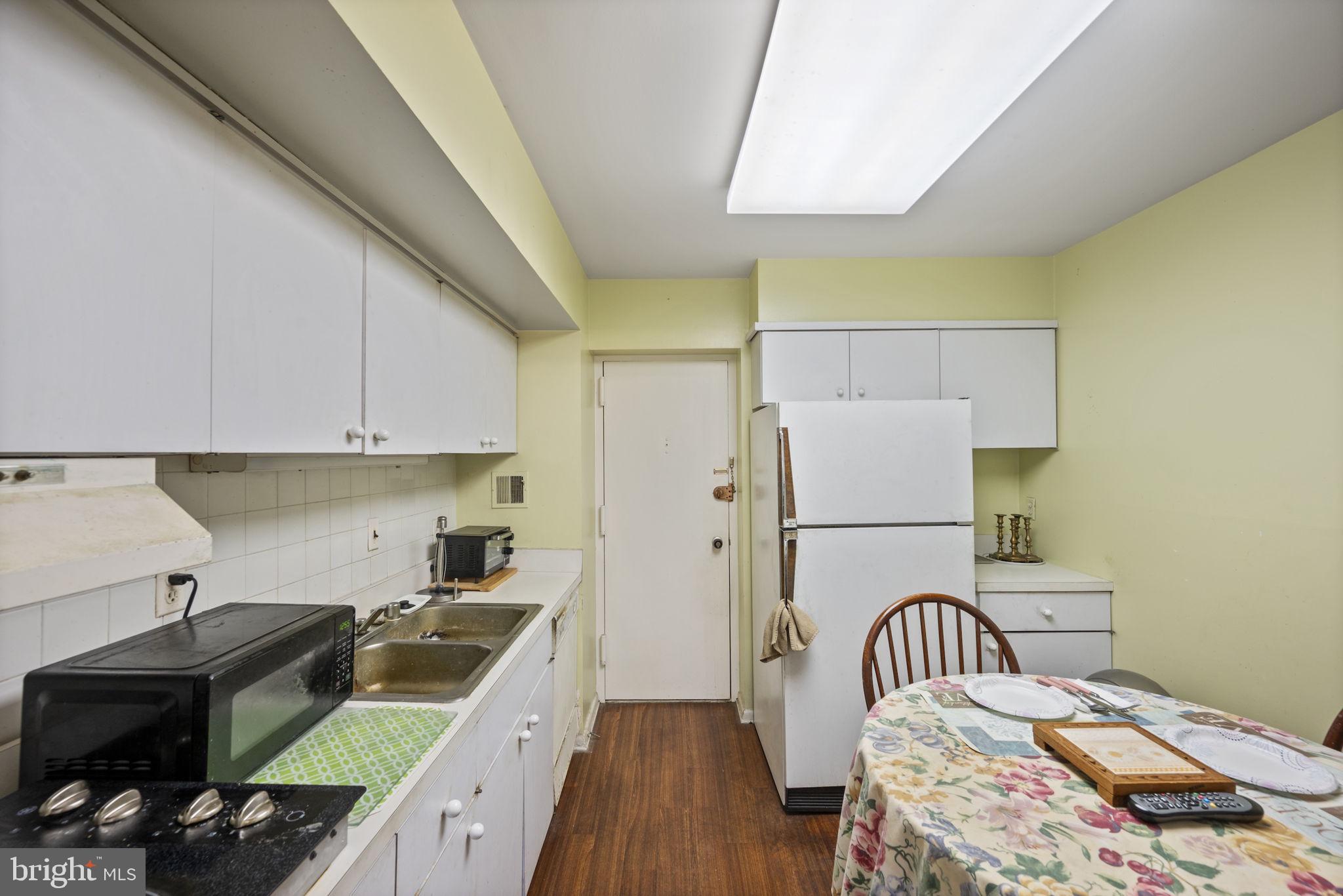 7 Slade Avenue, Unit 119 Baltimore, MD 21208 - Photo 29 of 41 Full kitchen view w/ 2nd enterance