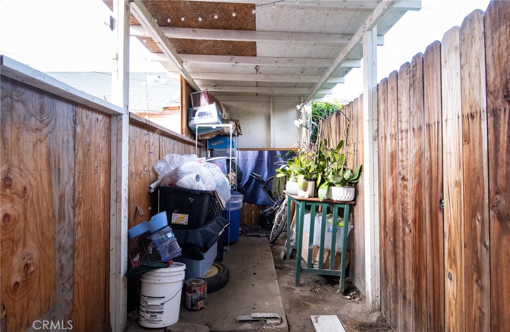 9814 Bandera Street Los Angeles, CA 90002 - Photo 15 of 15 a view of a porch with seating space