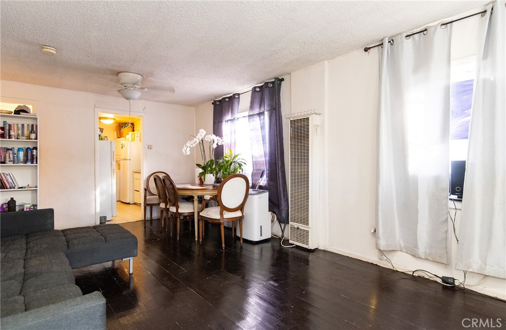 9814 Bandera Street Los Angeles, CA 90002 - Photo 8 of 15 a living room with furniture and a table