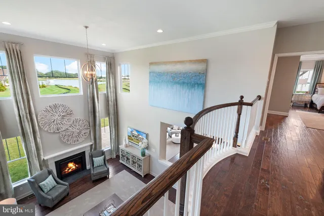 a view of a livingroom with furniture and a fireplace