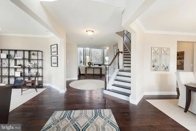 a view of a living room and wooden floor