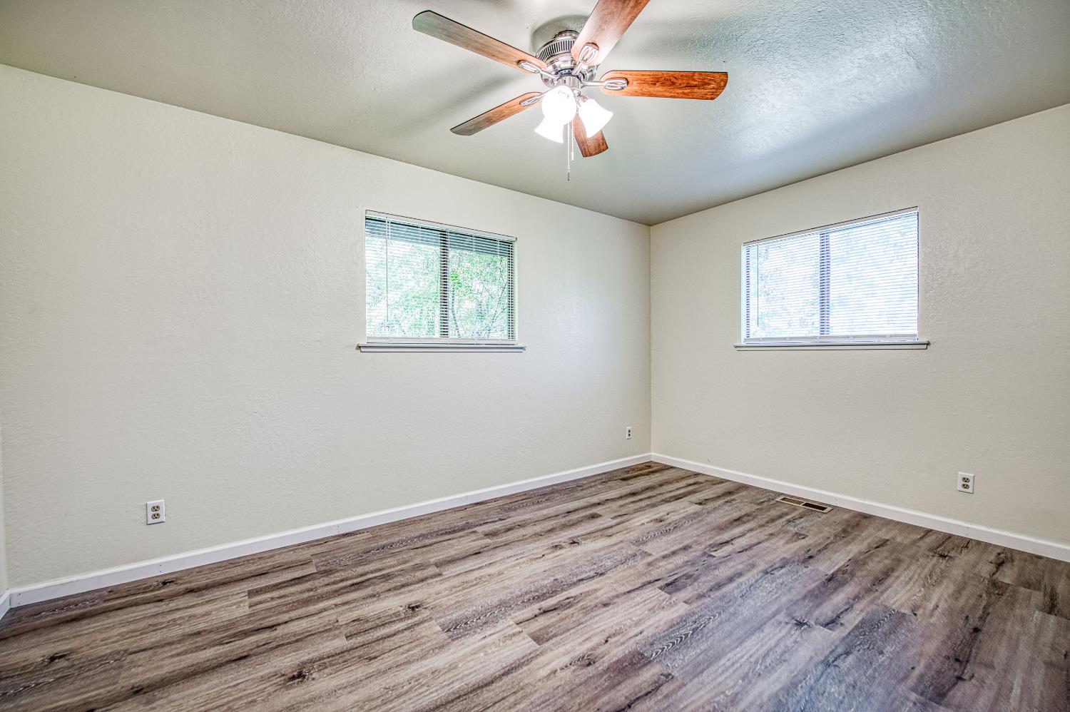33988 Shaver Springs Road Auberry, CA 93602 - Photo 29 of 34 a view of room with window and ceiling fan