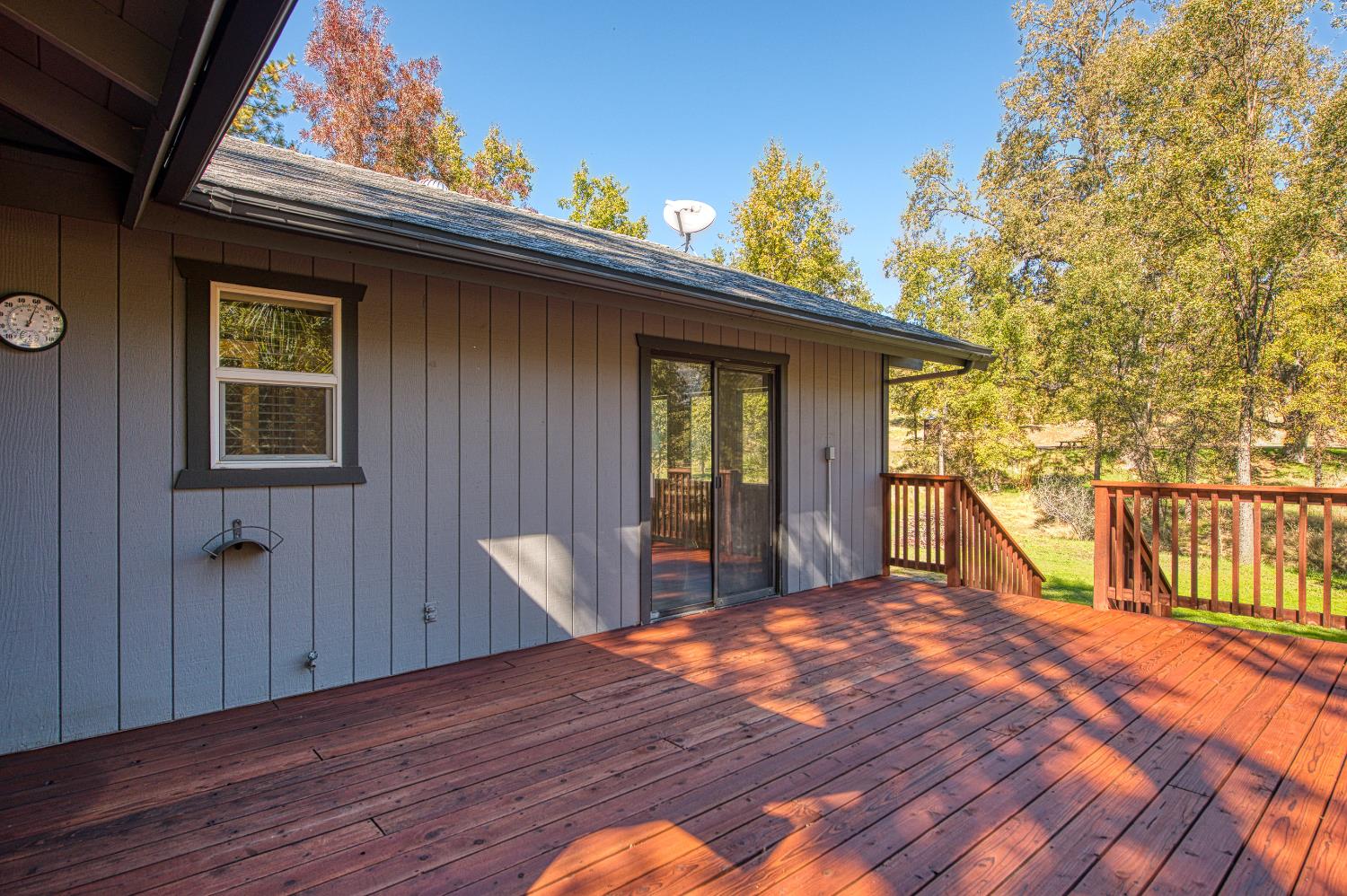 33988 Shaver Springs Road Auberry, CA 93602 - Photo 5 of 34 a view of a house with a small yard