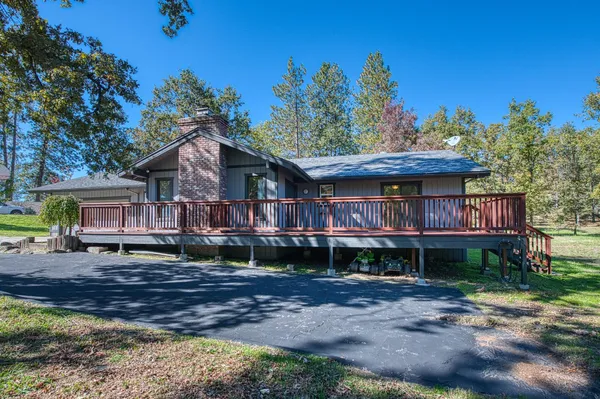 a front view of a house with a porch