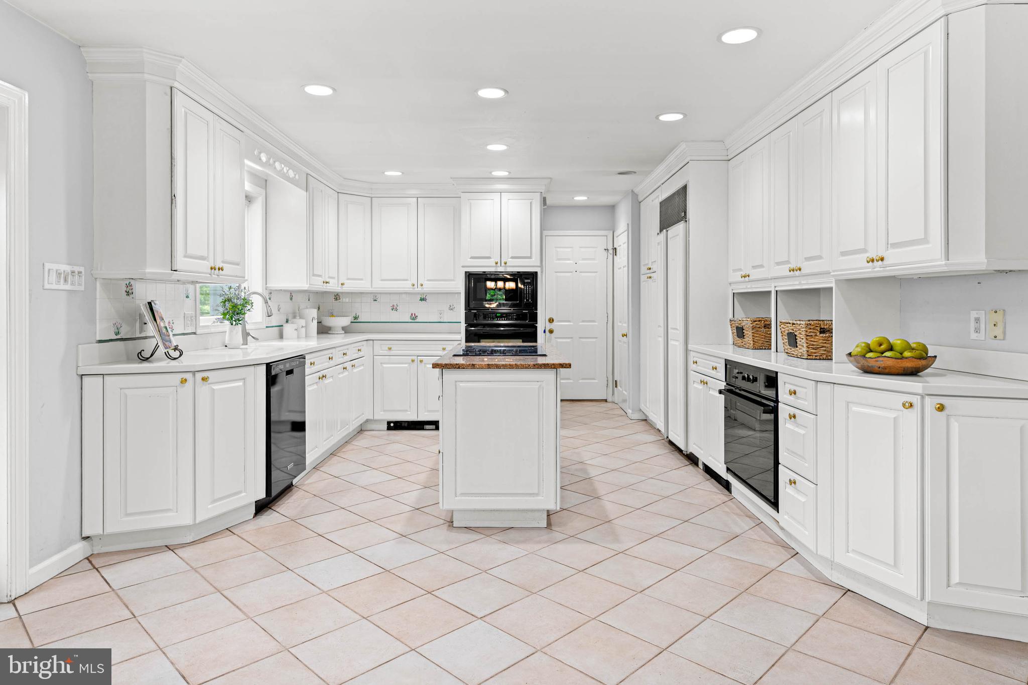 533 Gulph Road Wayne, PA 19087 - Photo 11 of 43 a kitchen with a sink window and stainless steel appliances