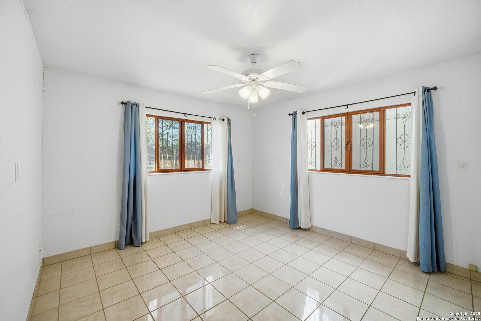 406 North Rancho Road Nixon, TX 78140 - Photo 19 of 31 a view of an empty room with window