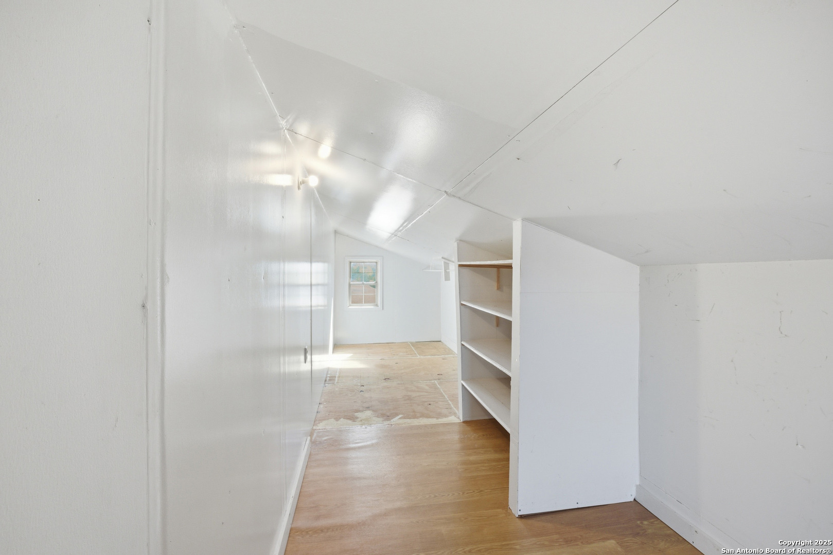 406 North Rancho Road Nixon, TX 78140 - Photo 27 of 31 a view of empty room with kitchen and window