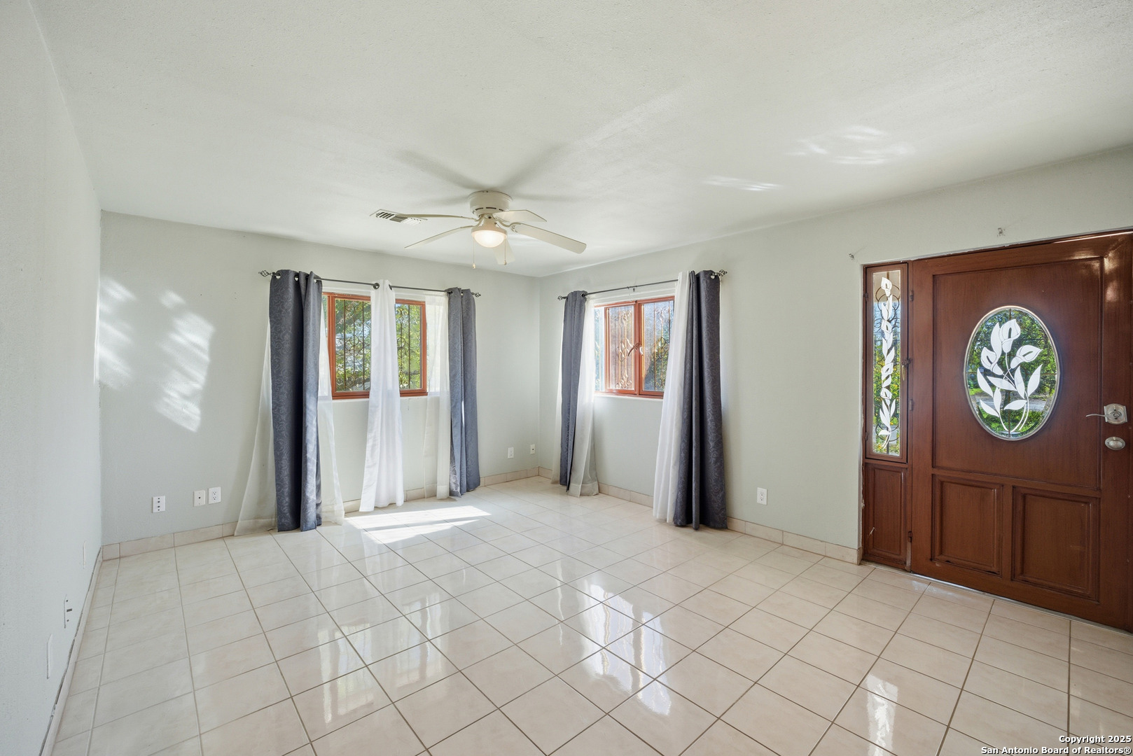 406 North Rancho Road Nixon, TX 78140 - Photo 8 of 31 a view of an entryway with wooden floor