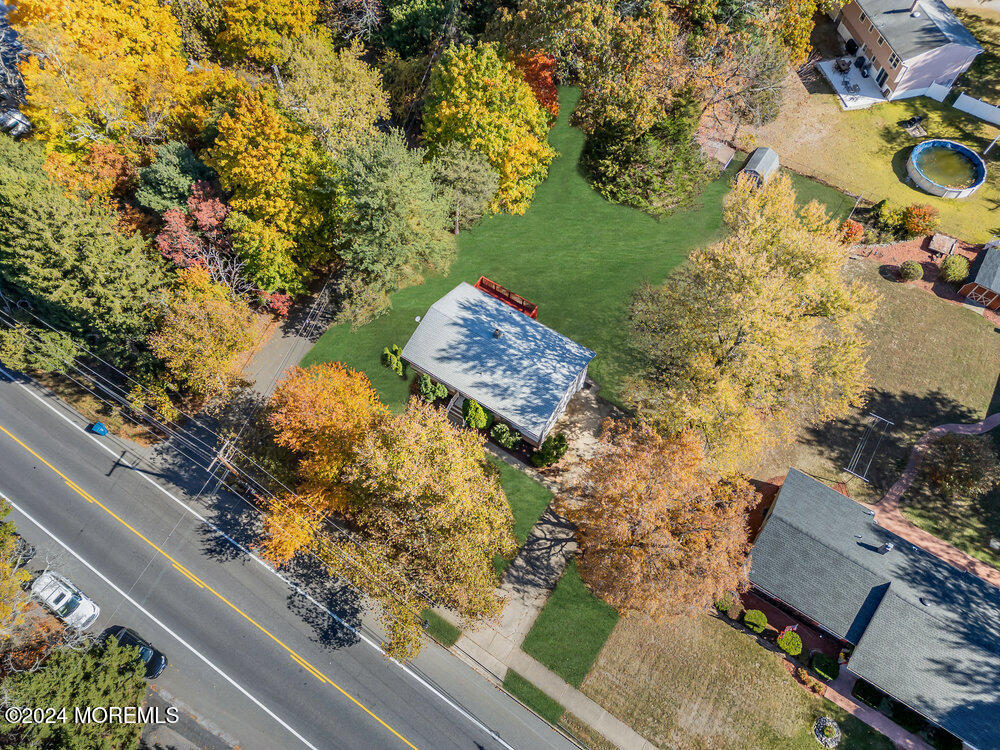 1069 Bennetts Mills Road Jackson, NJ 08527 - Photo 54 of 64 an aerial view of a house with a yard