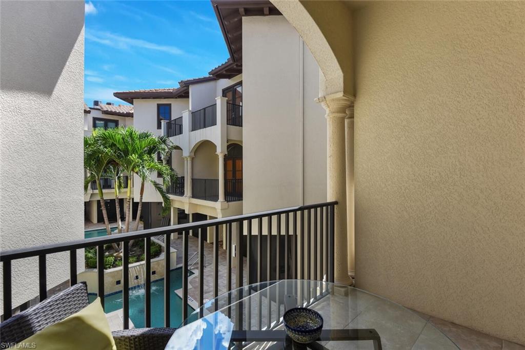 684 10th Avenue South, Unit D1 Naples, FL 34102 - Photo 16 of 45 a view of balcony with furniture
