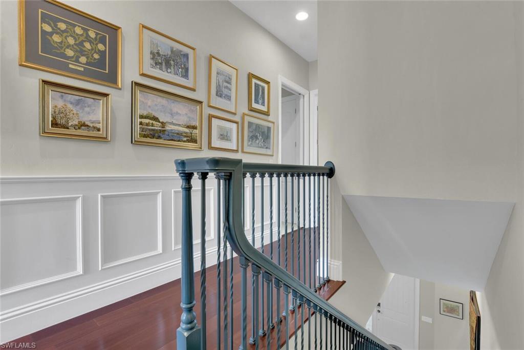 684 10th Avenue South, Unit D1 Naples, FL 34102 - Photo 18 of 45 a view of entryway with stairs and wooden floor