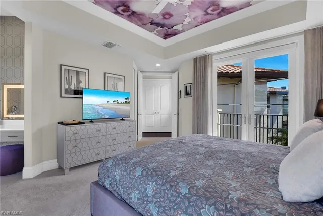 a living room with stainless steel appliances kitchen island granite countertop furniture and a kitchen view