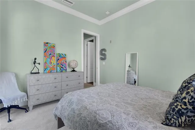 a bedroom with a bed and furniture