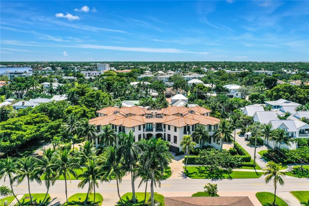 684 10th Avenue South, Unit D1 Naples, FL 34102 - Photo 44 of 45 an aerial view of a house with a garden