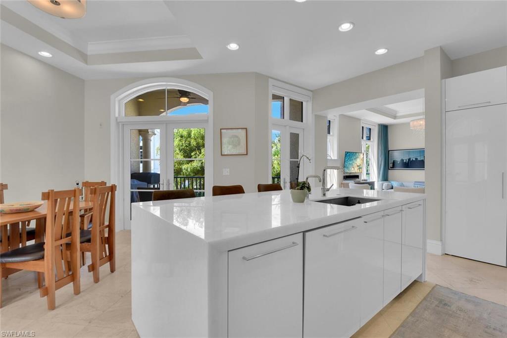684 10th Avenue South, Unit D1 Naples, FL 34102 - Photo 8 of 45 a view of living room and kitchen