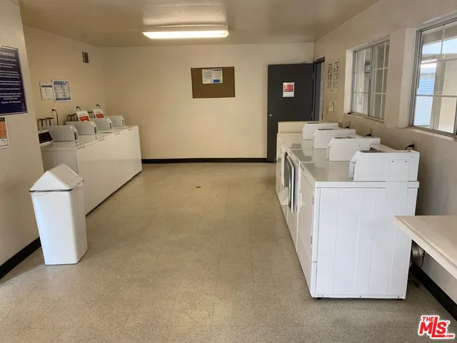 a sign that is sitting in front of a building