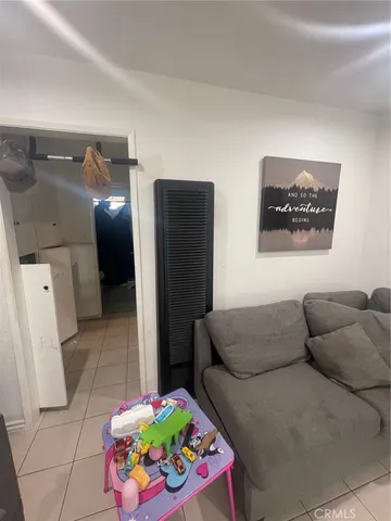 a living room with furniture and a couch