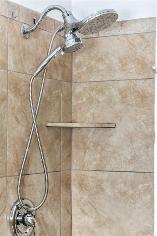 1006 Buckingham Drive Forney, TX 75126 - Photo 15 of 31 a bathroom with a shower