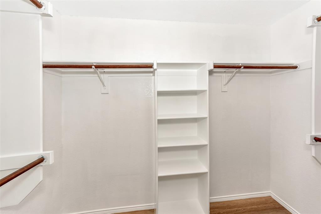 1006 Buckingham Drive Forney, TX 75126 - Photo 16 of 31 a view of walk in closet with empty racks